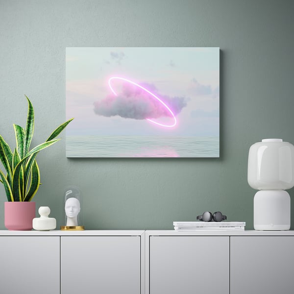 Neon cloud canvas print on wall with decor.