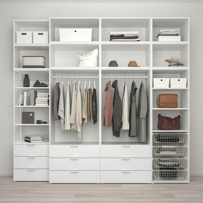 Modern white PLATSA wardrobe organizes clothes, accessories, and storage boxes efficiently.