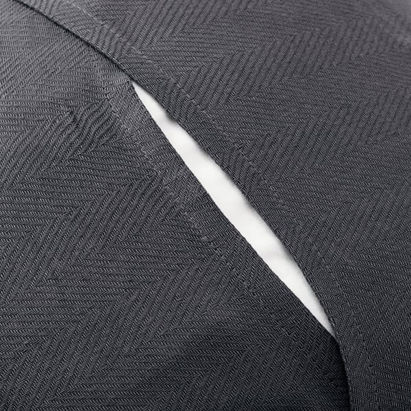 A folded dark grey fabric with herringbone pattern, likely a sustainable cotton cushion cover.