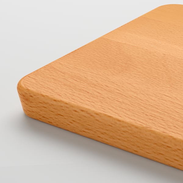 Smooth, high-quality wooden chopping board with rounded edges and a handle.