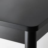 Close-up of smooth, high-quality tabletop with rounded edges and glossy finish. Shows fine wood grain and sturdy construction.