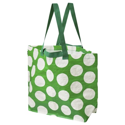 Green polka dot shopping bag with long handles. Made from recycled polypropylene.