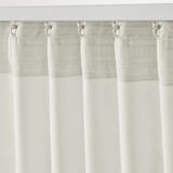 Textured white curtains with multi-way header, offer privacy & light filtering.