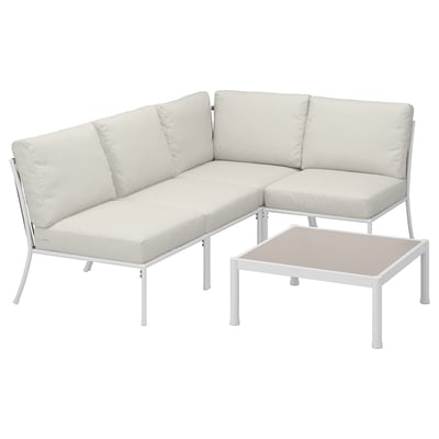 A modern white outdoor sectional & table set, ideal for balconies or patios, with sleek minimalist design.
