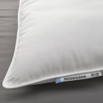 White SKOGSFRÄKEN pillow, rectangular, soft, with breathable cotton/lyocell cover, supportive for stomach sleepers.