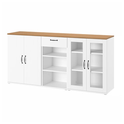 A white SKRUVBY cabinet with glass doors and wooden countertop.