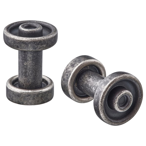 Two round, grey metallic cabinet knobs with smooth design.