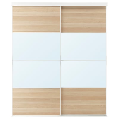 SKYTTA sliding wardrobe with white and light brown panels, minimalist design,inner storage.