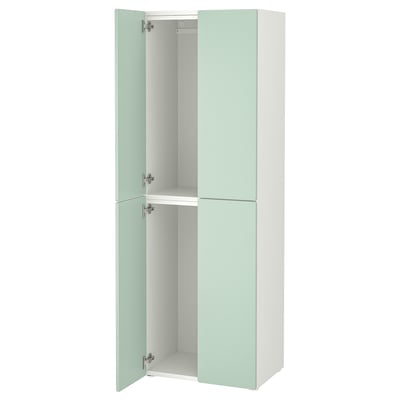 A tall, narrow wardrobe SMÅSTAD with light green doors and a white interior, featuring multiple compartments.