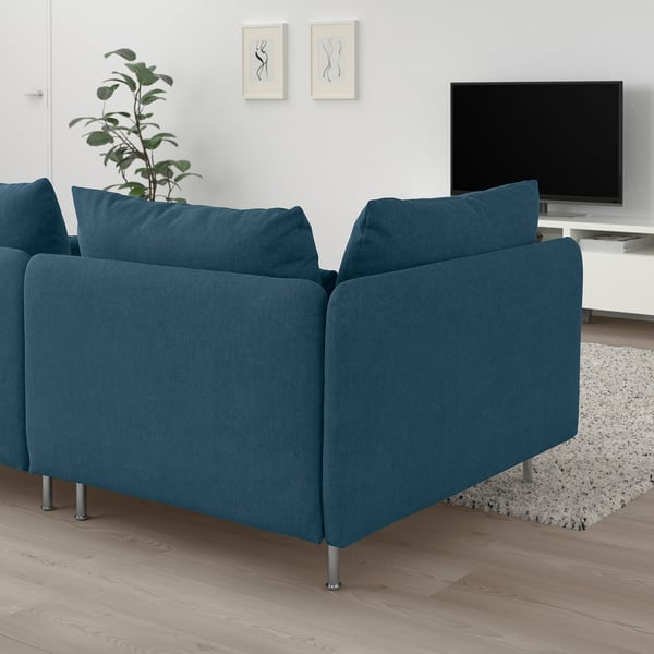 SÖDERHAMN teal sofa, modern low design, spacious, with dark blue cushions. A large, comfortable centerpiece in the room.
