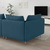 SÖDERHAMN teal sofa, modern low design, spacious, with dark blue cushions. A large, comfortable centerpiece in the room.