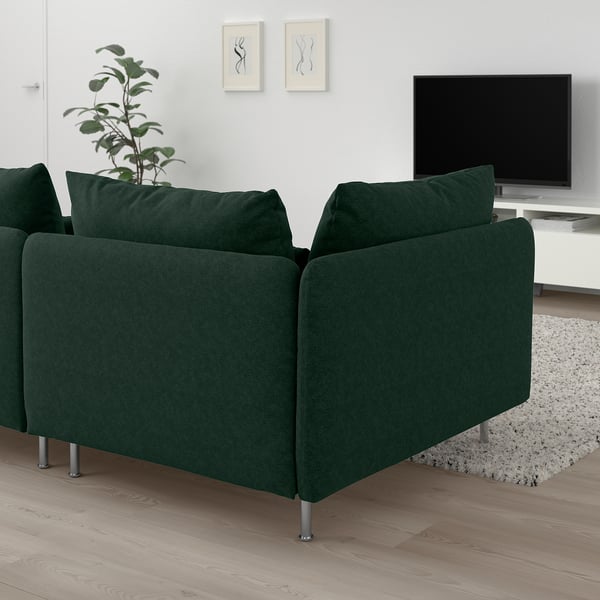Dark green SÖDERHAMN sectional sofa with cushions in living room, near tv.