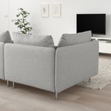 Modern living room with light gray SÖDERHAMN sectional, tv, plant, and rug.