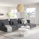 Modern living room with SÖDERHAMN sectional, wicker lamp, coffee table, and plants.