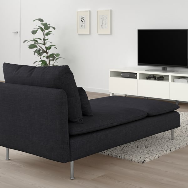 Modern living room with dark grey SÖDERHAMN chaise longue, flat-screen tv, and plant.