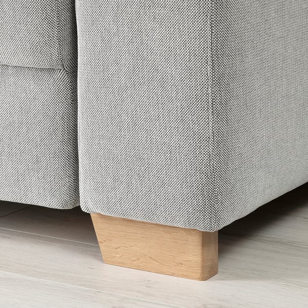 Modern sofa with light grey textured fabric and sturdy light oak legs. High-quality, minimalist scandinavian design.