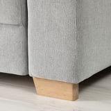 Modern sofa with light grey textured fabric and sturdy light oak legs. High-quality, minimalist scandinavian design.