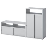 Light gray SPIKSMED furniture set with sliding doors and open shelves.