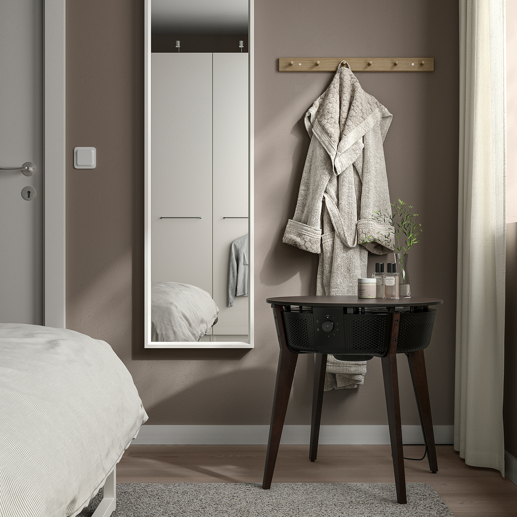 Modern bedroom with STARKVIND air purifier table, towel rack, gray walls, white linens, simplicity.