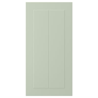 A STENSUND green cabinet door with grooved panels, made of fibreboard and polyurethane paint, rectangular in shape with a sleek design.