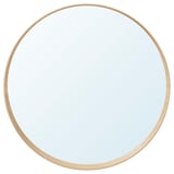 A round mirror named STOCKHOLM with an ash veneer frame. It has a unique design with a bottom shelf for accessories.