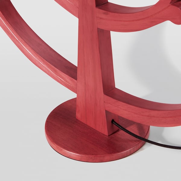 Red wooden candelabra with candle-like led lights, showcasing quality craftsmanship.