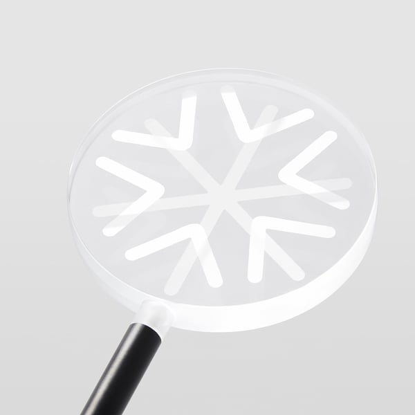 Modern white led snowflake light with sleek handle, emitting soft, warm glow. Ideal for outdoor decoration.
