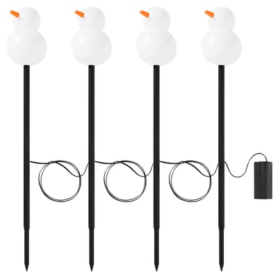 Four white snowman-shaped led lights on black sticks, with orange noses, powered by a battery box, perfect for outdoor christmas decoration.