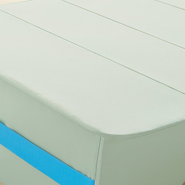 Lightweight, foldable tray table with elastic bands for stability.