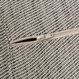 Close-up of a zipper on a well-woven, durable fabric bag, emphasizing detailed craftsmanship and quality.