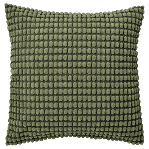A SVARTPOPPEL cushion cover in green. Its square-shaped with a raised dot pattern and made of recycled polyester.