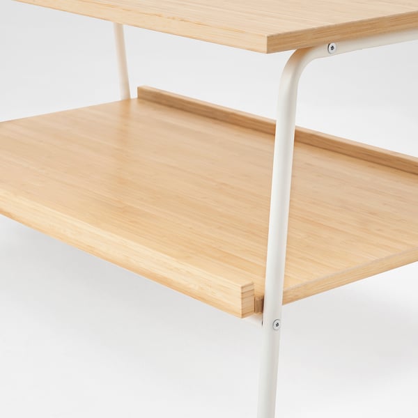 Modern bamboo coffee table with two shelves, sturdy and stylish.