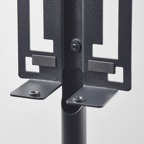 Black metal floor stand for speaker, sturdy construction, adjustable brackets.