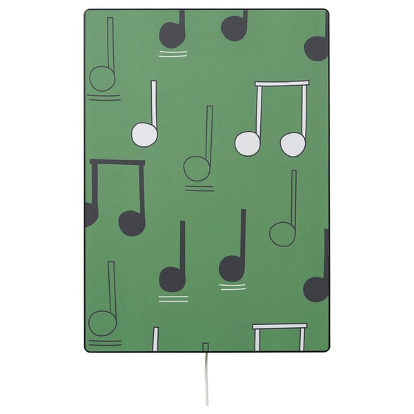 Green SYMFONISK music note fabric cover, rectangular with white cord.