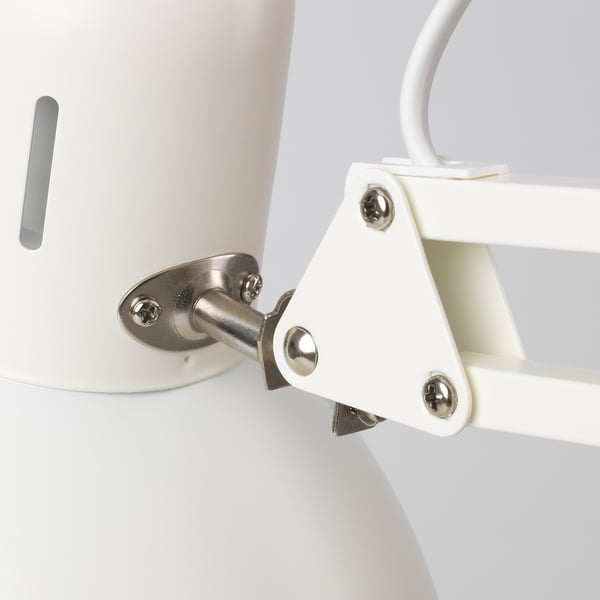 Close-up of TERTIAL lamps metallic arm joint with screws and clamp demonstrating robust construction.
