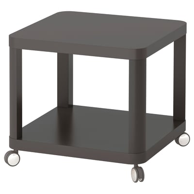 Black square rolling side table on four wheels, modern design, easy to move.