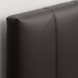 Close-up of TJÅLLE headboard, soft, dark fabric with neat stitching, showing high-quality texture and craftsmanship.