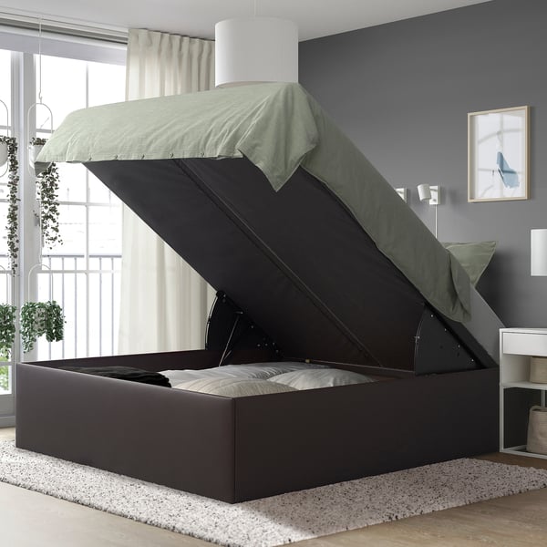 Modern bed with storage. Lifts to reveal hidden space. Automatically stays open.