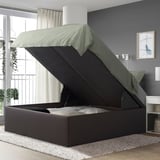 Modern bed with storage. Lifts to reveal hidden space. Automatically stays open.