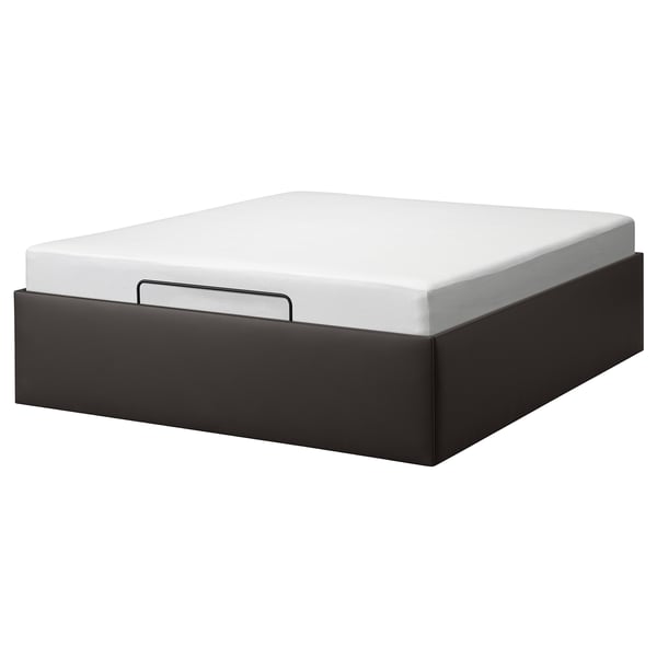 Black TJÅLLE storage bed, rectangular, modern design with white mattress.