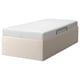 TJÅLLE bed in beige, rectangular, upholstered with recycled polyester, featuring storage space and a modern style.