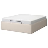 TJÅLLE storage bed in beige with white mattress, rectangular shape, modern design.