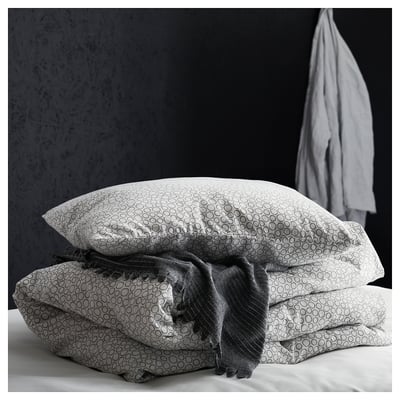 Gray TJÄRBLOMSTER bedspread, soft fleece, folded, textured edge.