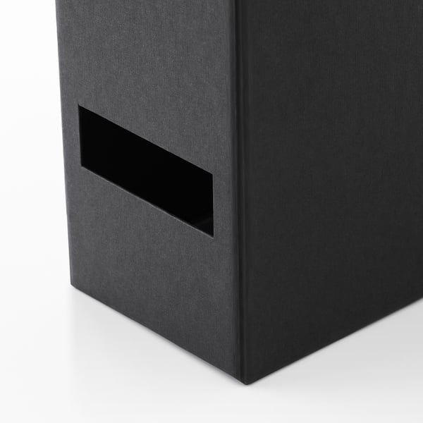 Black recycled magazine holder with handle, sleek design.