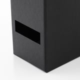 Black recycled magazine holder with handle, sleek design.