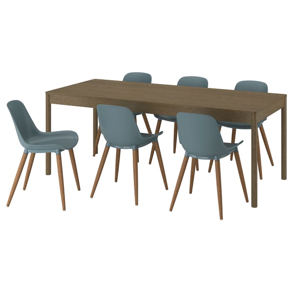 A dining set with a brown wooden table and blue plastic chairs.