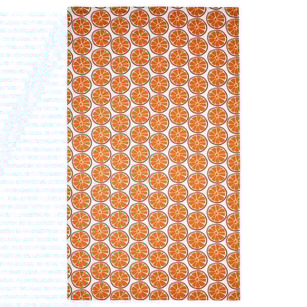 The TORVFLY tablecloth is bright orange, circular, recycled polyester with repeating fruit slice patterns, adding a cheerful vibe.