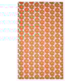 The TORVFLY tablecloth is bright orange, circular, recycled polyester with repeating fruit slice patterns, adding a cheerful vibe.