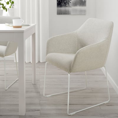 TOSSBERG: modern dining chair with light gray fabric, m-legs, armrests, space-saving.
