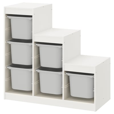A white TROFAST storage unit with six grey plastic bins, arranged in two columns of three, in a staircase shape.